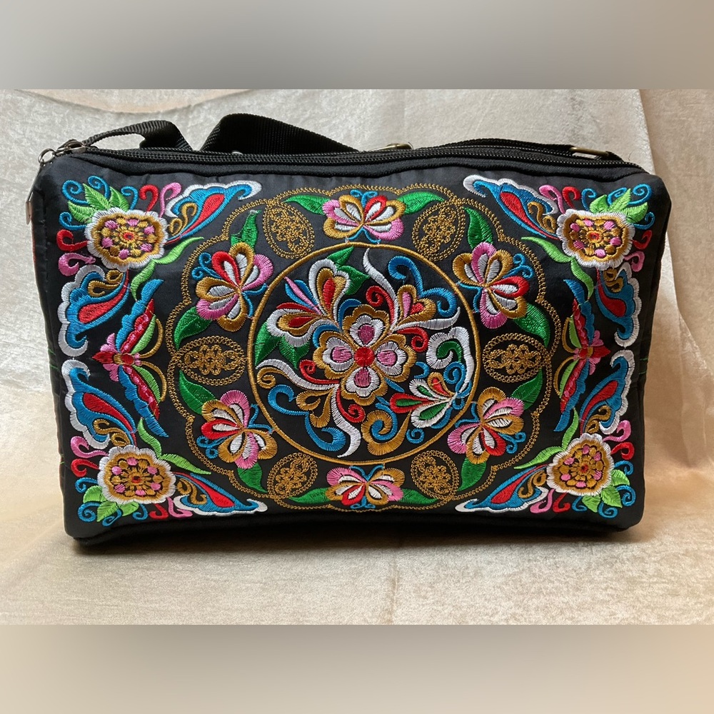 Embroidered crossbody bag with three separate zippered compartments, NWOT